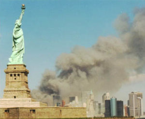 National_Park_Service_9-11_Statue_of_Liberty_and_WTC